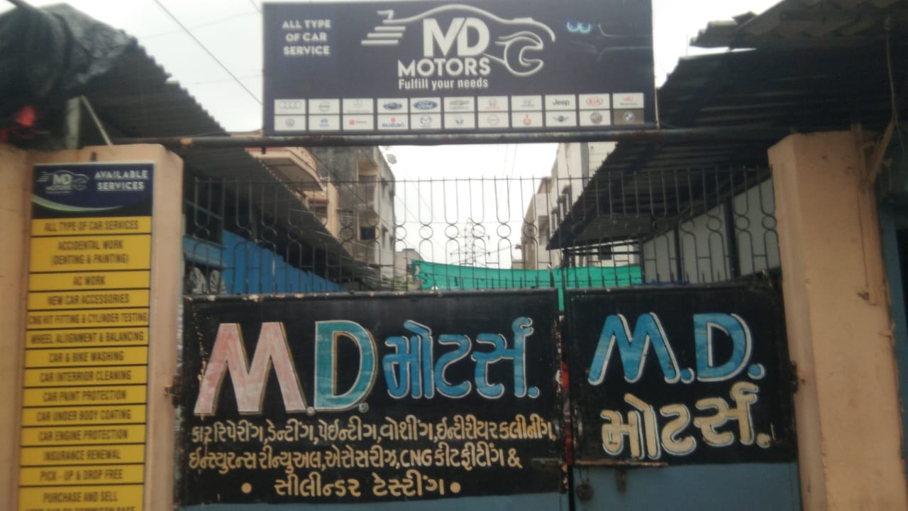 M. D. MOTORS